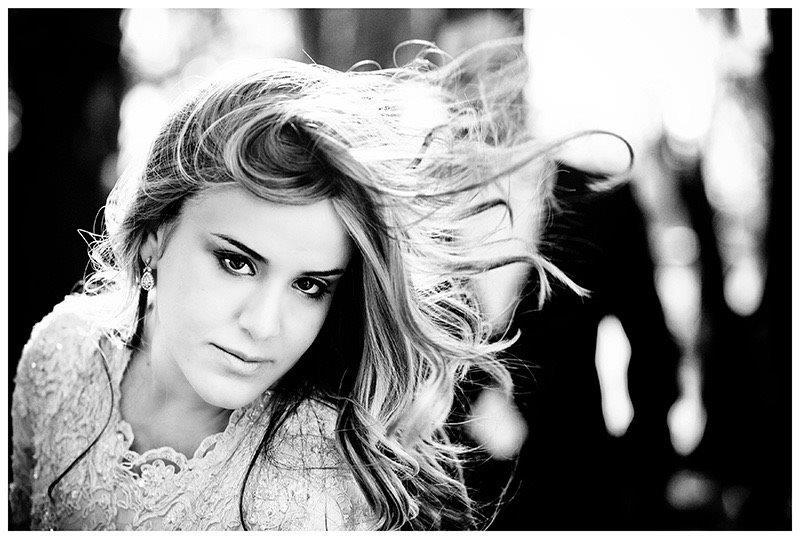Editorial black and white portrait with windswept hair